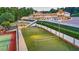 Aerial view of lighted tennis and volleyball courts at 5326 Presley Pl, Douglasville, GA 30135