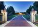 Gated entry to a large estate with a long driveway at 5326 Presley Pl, Douglasville, GA 30135