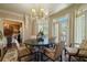 Breakfast room with a round table, chairs, and view to the backyard at 5326 Presley Pl, Douglasville, GA 30135