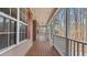 Long view of the front porch overlooking wooded area at 1117 Campbell Rd, Lawrenceville, GA 30045