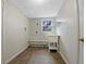 Basement laundry room with utility sink and tile floor at 47 Makayla Way, Temple, GA 30179
