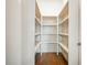 Walk-in pantry with ample shelving for storage at 987 Kora Sw Dr, Marietta, GA 30064