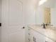 Small bathroom with white vanity and granite countertop at 987 Kora Sw Dr, Marietta, GA 30064