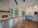 Open floor plan with hardwood floors, stone fireplace and kitchen at 987 Kora Sw Dr, Marietta, GA 30064