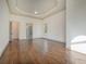 Spacious main bedroom with hardwood floors and private bath access at 987 Kora Sw Dr, Marietta, GA 30064