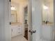 Double vanity bathroom with granite countertops at 987 Kora Sw Dr, Marietta, GA 30064