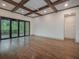 Spacious living room with hardwood floors, high ceilings and access to outdoor space at 987 Kora Sw Dr, Marietta, GA 30064