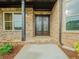 Elegant entryway with double doors and stone flooring at 987 Kora Sw Dr, Marietta, GA 30064