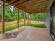Covered patio with view of fenced backyard at 987 Kora Sw Dr, Marietta, GA 30064