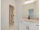 Bathroom with white vanity, granite countertop, and tile floor at 987 Kora Sw Dr, Marietta, GA 30064