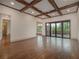 Spacious living room with hardwood floors, high ceilings and access to outdoor space at 987 Kora Sw Dr, Marietta, GA 30064