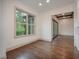 Bright dining room with hardwood floors and access to a deck at 987 Kora Sw Dr, Marietta, GA 30064