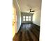 Bright bedroom with wood-look flooring and ceiling fan at 2172 Avion Way # 10, Chamblee, GA 30341