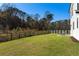 Spacious backyard with a grassy lawn and privacy fence at 428 10Th St, Auburn, GA 30011