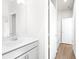 Clean bathroom with white vanity, toilet, and wood-look flooring at 428 10Th St, Auburn, GA 30011