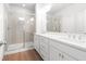 Spa-like bathroom with double vanity and walk-in shower at 428 10Th St, Auburn, GA 30011