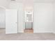 Bedroom with carpet flooring and access to bathroom at 428 10Th St, Auburn, GA 30011