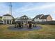 Outdoor firepit area with seating in a residential community at 428 10Th St, Auburn, GA 30011
