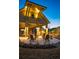 Evening view of community patio with seating and lighting at 428 10Th St, Auburn, GA 30011