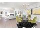 Dining area with chandelier and stylish modern furniture at 428 10Th St, Auburn, GA 30011