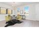 Dining area with chandelier and stylish modern furniture at 428 10Th St, Auburn, GA 30011