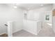 Bright and airy upstairs hallway with carpet flooring at 428 10Th St, Auburn, GA 30011