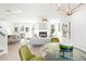 Open concept living and dining area with hardwood floors and fireplace at 428 10Th St, Auburn, GA 30011