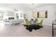 Open concept living and dining area with hardwood floors and fireplace at 428 10Th St, Auburn, GA 30011