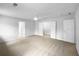 Large bedroom with neutral carpeting and walk-in closet at 130 Ashley Oaks Dr, Mcdonough, GA 30253