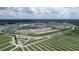 Aerial view of a large racetrack with surrounding parking lots at 11682 Chatham Dr, Hampton, GA 30228