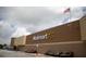 Exterior view of a Walmart supercenter with ample parking at 11682 Chatham Dr, Hampton, GA 30228