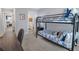 Bedroom with bunk bed, desk and view of another room at 11682 Chatham Dr, Hampton, GA 30228
