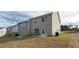 Private backyard with patio and wooden fence at 11682 Chatham Dr, Hampton, GA 30228