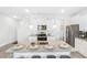 Modern kitchen with granite countertops and white cabinets at 11682 Chatham Dr, Hampton, GA 30228