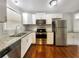 Updated kitchen featuring stainless steel appliances and granite counters at 1819 Rosewood Rd, Decatur, GA 30032