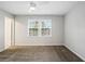 Spacious bedroom with ceiling fan and carpet flooring at 169 Barone Nw Pl, Atlanta, GA 30327