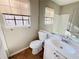 Simple bathroom with white vanity and tile floor at 4332 N Hickory Ln, Douglasville, GA 30134