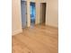 Light and bright hallway with light oak hardwood floors at 2559 Oakbourne Ln, Smyrna, GA 30080