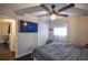 Bedroom with large TV and built-in closet at 340 Sir Richard Ct, Jonesboro, GA 30236