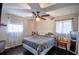 Spacious bedroom with ceiling fan and hardwood floors at 340 Sir Richard Ct, Jonesboro, GA 30236