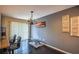 Elegant dining area with chandelier and dark hardwood floors at 340 Sir Richard Ct, Jonesboro, GA 30236