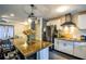 Updated kitchen with granite countertops and white cabinets at 340 Sir Richard Ct, Jonesboro, GA 30236