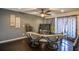 Cozy living room featuring dark hardwood floors and two armchairs at 340 Sir Richard Ct, Jonesboro, GA 30236