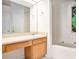 Bathroom with vanity, tub and shower at 6674 Eastbriar Dr, Lithonia, GA 30058