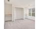 Spacious bedroom with large closet and window at 6674 Eastbriar Dr, Lithonia, GA 30058