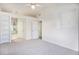 Large main bedroom with high ceilings and built-in shelving at 6674 Eastbriar Dr, Lithonia, GA 30058