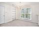 Dining room featuring a chandelier and large window at 6674 Eastbriar Dr, Lithonia, GA 30058