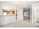 Dining area with chandelier and built-in shelving at 6674 Eastbriar Dr, Lithonia, GA 30058