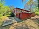 Red brick house with a basement and spacious backyard at 650 Lyric Nw Way, Atlanta, GA 30318