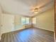 Living room with ceiling fan and wood-look flooring at 650 Lyric Nw Way, Atlanta, GA 30318
